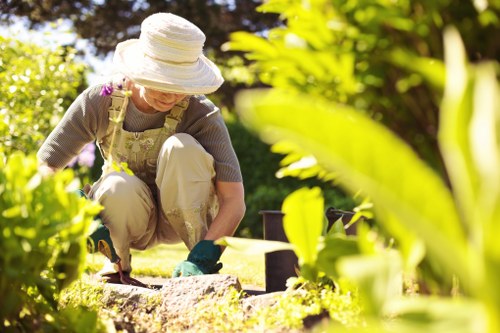 Gardening team arriving at a residential garden with equipment