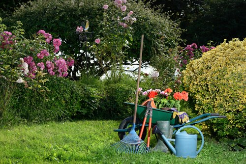 Front view of a Yeading garden with tools and pathways, representing local gardening services